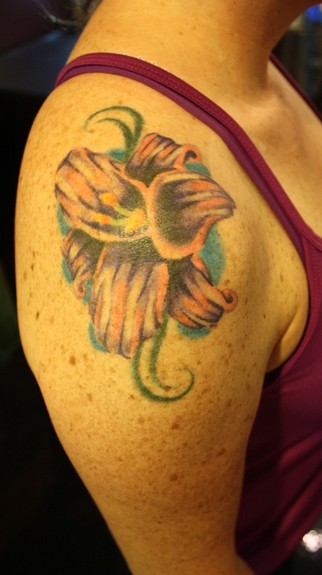 Ty McEwen - terrible lilly tattoo